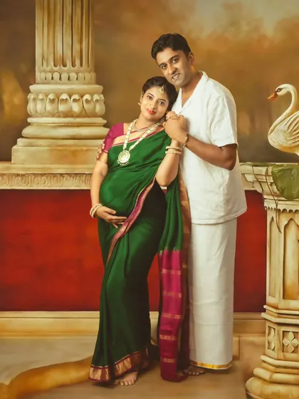 A beautiful couple's portrait against a painterly backdrop, evoking the romance and artistry of a classic painting.