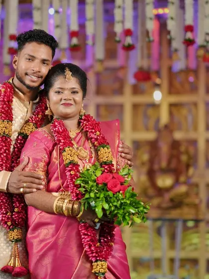 A classic portrait of a couple from their wedding reception, a timeless memory of their celebration.