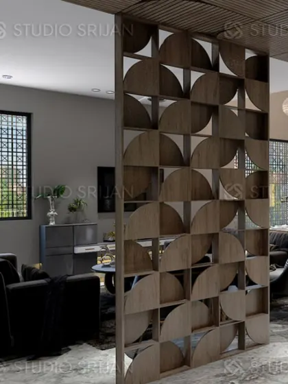 A lobby in Varanasi with a unique wooden partition that creates visual interest while separating spaces. The design has a modern yet rustic feel.
