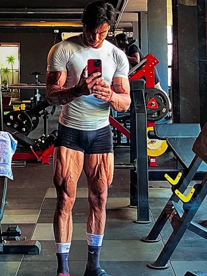 My belief is stronger than your doubt. A full body shot showcasing my leg and core definition, a testament to my unwavering self belief.