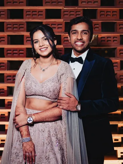 The happy couple. Shilpi's classic, minimal sangeet look is a testament to the idea that less can be more, even for a grand celebration.