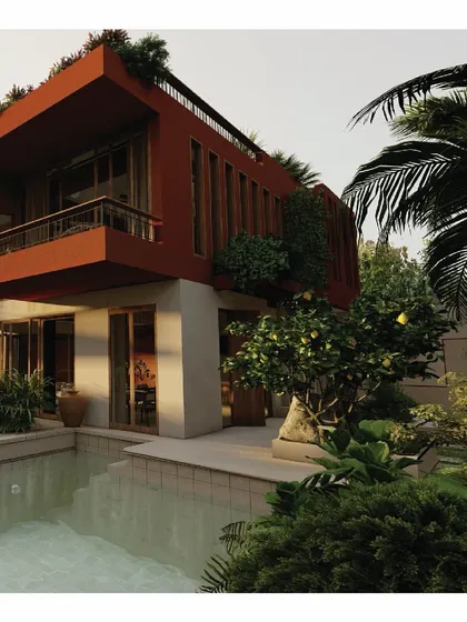 Another view of the 'Red Haus', showcasing its bold red forms against the lush green landscape and private pool. The design emphasizes a strong connection to the outdoors, with large openings and natural materials.