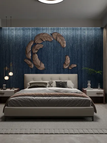 Create a serene retreat with this artistic and elegant bedroom design. The deep blue textured accent wall with a bronze feather sculpture creates a dramatic yet calming focal point, perfect for a restful space.