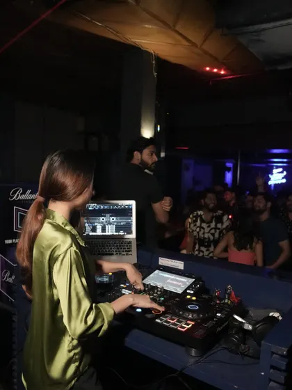 Here I am at my deck in Dehradun, getting ready to drop the next track for a wild crowd.