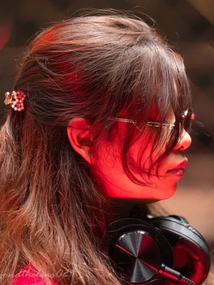 A close-up profile shot from a noon gig. Even when I'm focused on the music, I like to maintain a cool and confident style.