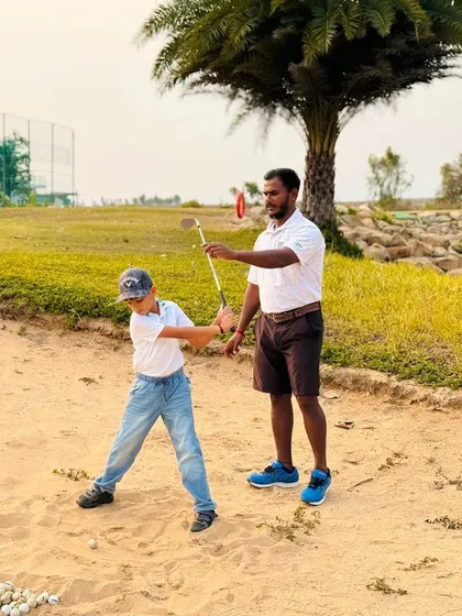 Our coaches are constantly on the range, providing hands-on instruction. From demonstrating a swing path to analyzing a student's setup, these moments of direct mentorship are where real progress is made.