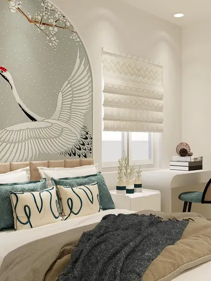 A detailed shot of the crane mural and the soft, layered bedding, highlighting the tranquil and elegant aesthetic of the room.