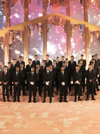 Our service team, standing proud and ready for the event. Dressed in sharp uniforms, they represent the professionalism and discipline that we bring to every celebration.