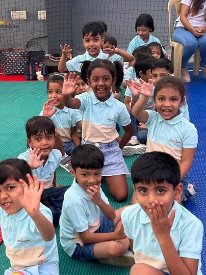 Celebrating World Laughter Day. A group of our children wave happily, their smiles and energy lighting up the room.
