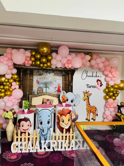 A full view of the pink and gold jungle theme, perfect for a little girl's first birthday.