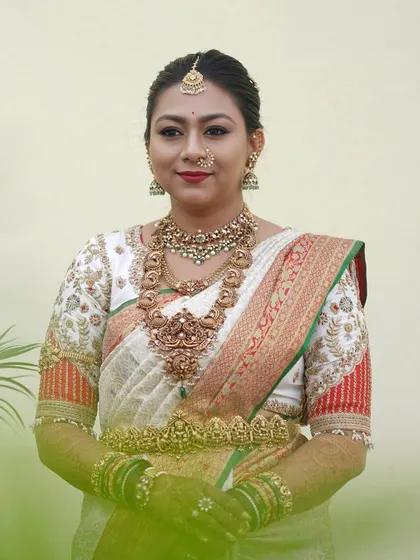A full portrait of the bride, her traditional attire and confident pose creating a stunning image.