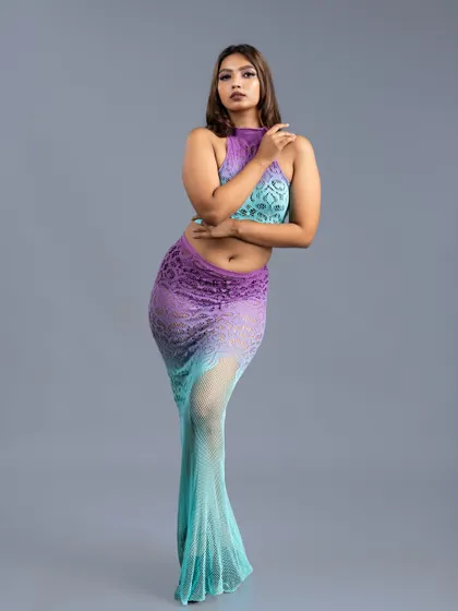 A full-length shot of the ombre lace outfit, showing its mermaid-like silhouette.