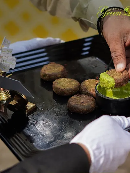These Hara Bhara Kebabs are a healthy and flavorful option. Made with spinach, peas, and potatoes, they are pan-fried and served with a zesty green chutney for the perfect bite.