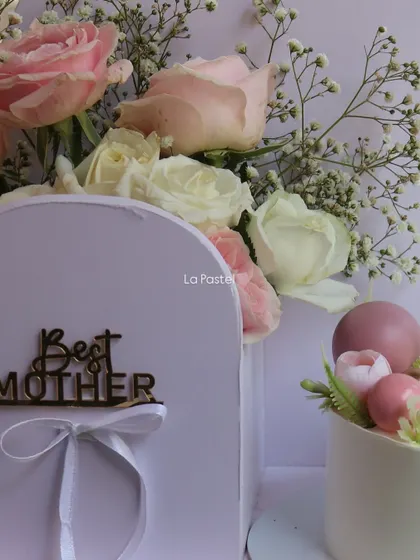 The beautiful pink and white roses from the Mother's Day flower box.