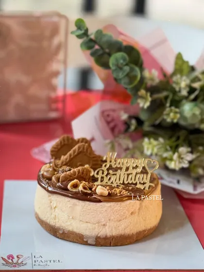 A clear, bright shot of the Biscoff and Nutella cheesecake, showing the crunchy biscuit base and creamy filling.