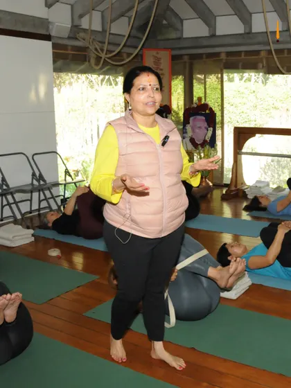 I am addressing the class, explaining a key concept. My teaching is a blend of demonstration, explanation, and hands-on adjustment.