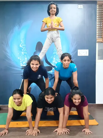 The whole is greater than the sum of its parts. Our students work together to create a human pyramid, a fun exercise in teamwork and support.