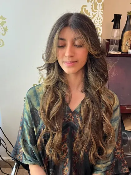 The layers add volume and movement while keeping the length.