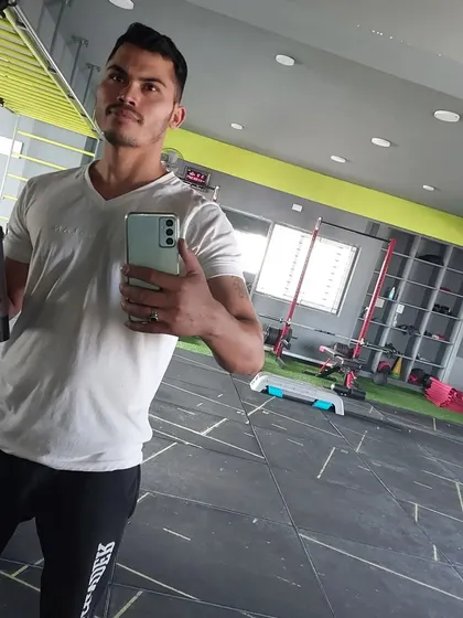 Staying hydrated after an arm day session. Proper recovery is a critical part of any effective strength training plan.