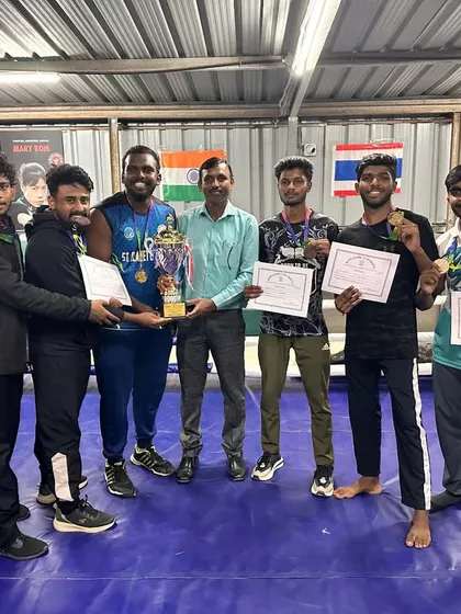 My team as the runners-up at the Bangalore University Boxing Championship, a hard-fought competition.