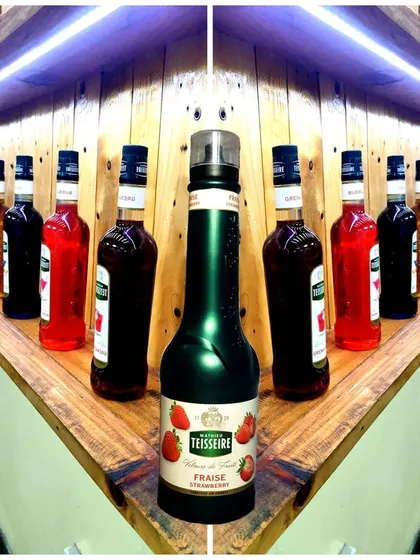 A creative shot of the wide range of syrups we use. We believe in giving our students a full palette of "true flavours" to create with.