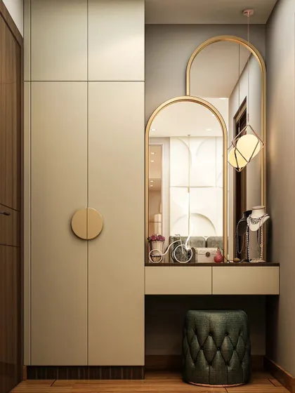 A space-efficient wardrobe and dressing table combination. The simple, clean lines of the wardrobe are paired with an elegant arched mirror and a comfortable stool, creating a chic and practical corner.
