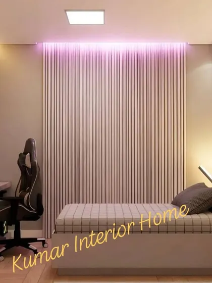 This view shows the gaming desk and chair next to the bed, creating a dedicated zone for play.