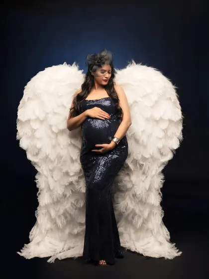 A full-length view of the angel wings concept, showing how the feathered wings create a stunning and dramatic effect.