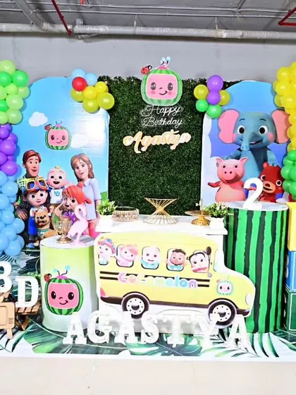 A fun and bright Cocomelon theme for Agastya's second birthday. We used a greenery backdrop, character cutouts, large "ABC" blocks, and a colourful balloon garland to create a playful and educational party setting.