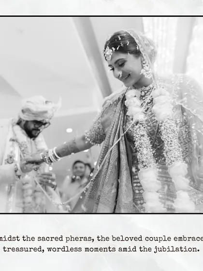 A timeless black and white shot of the couple during their sacred pheras, capturing a quiet, wordless moment of connection.