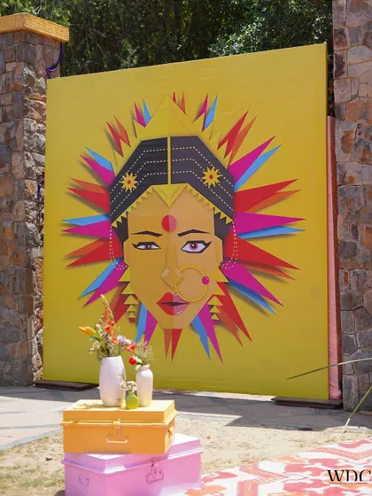 We love adding quirky and artistic elements to our decor. This large, colorful pop art panel served as a fantastic photo backdrop, perfectly capturing the fun and peppy spirit of the Haldi celebration.