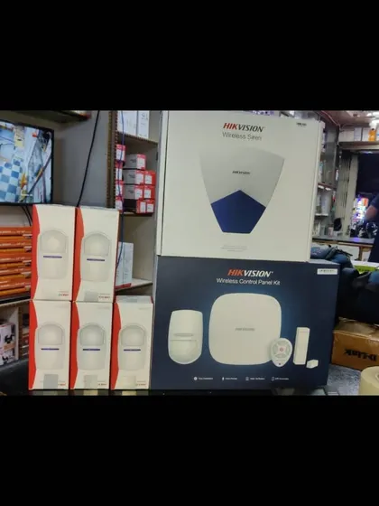 A complete Hikvision wireless alarm kit, including motion detectors and a central hub, which I can integrate with your camera system.