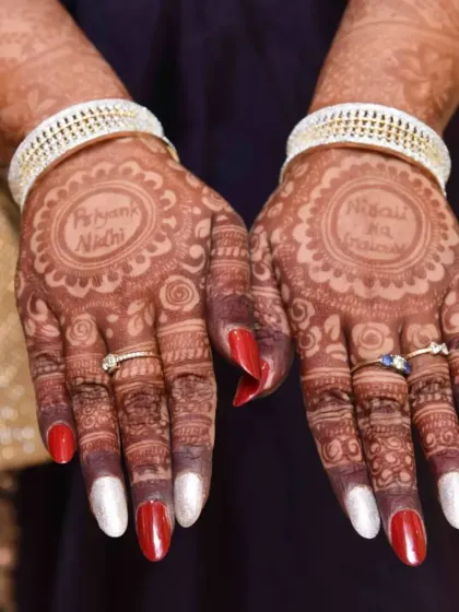 A beautiful stain result for a client, with the couple's names written in the center of the mandalas. It's a lovely way to personalize your mehndi.
