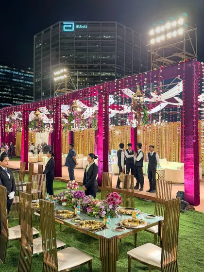 From intimate gatherings to grand outdoor galas, we have the expertise to manage events of any scale. This stunning nighttime setup for a corporate event showcases our ability to create a magnificent ambiance with flawless execution.