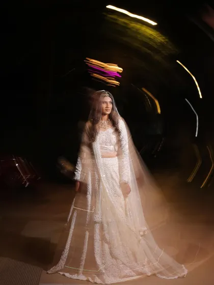A creative wedding portrait using a circular motion blur technique for an abstract and artistic feel.