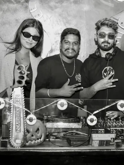 A black and white shot with the crew at Tipsy Bull.