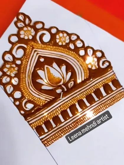 A practice drill for a lotus-themed cuff. This design combines a central lotus with delicate floral and leaf patterns.