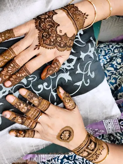 A unique design with a heart-shaped pattern on the back of one hand.