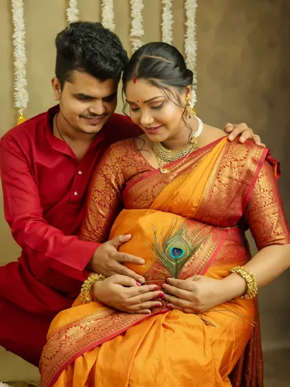 A sweet, intimate moment during a traditional maternity session. The way he looks at you, full of love and admiration, is what makes these couple portraits so precious.