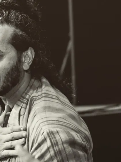 A heartfelt, smiling moment captured off-stage with music director Pritam.