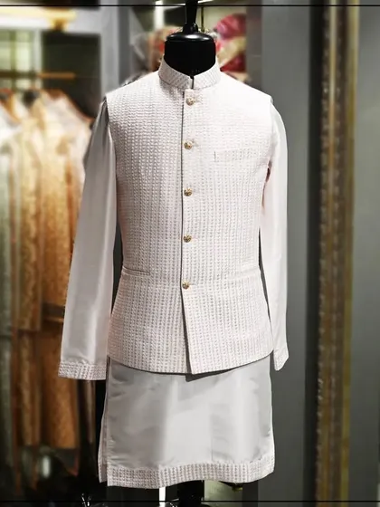 Another angle of the off-white textured Nehru jacket and kurta set, showcasing its clean and sophisticated look.