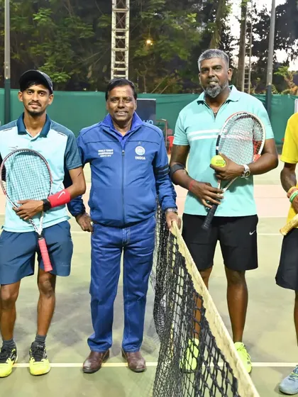 Myself and other senior coaches posing by the net. We work together as a team to provide the best possible guidance and madat to every single player who joins our academy.