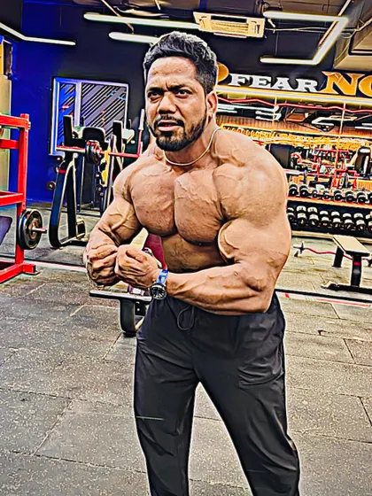 A most muscular pose, showing the results of being at the top of my game.