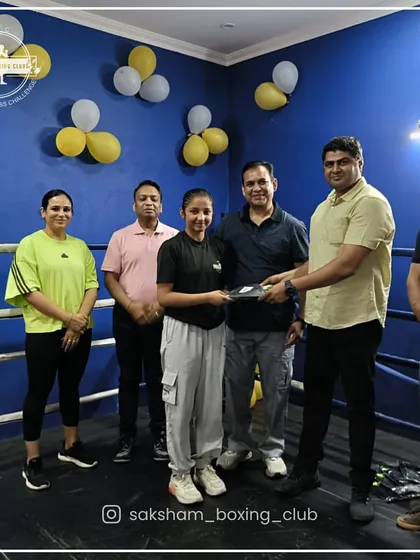 Celebrating our members' achievements is a big part of our culture. Here, we recognize a trainee for her dedication and progress in the ring.