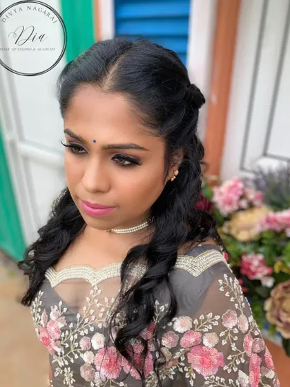 This portrait shows how the soft glam makeup looks natural and beautiful in outdoor lighting. It's a versatile style that is perfect for capturing timeless pre-wedding memories.