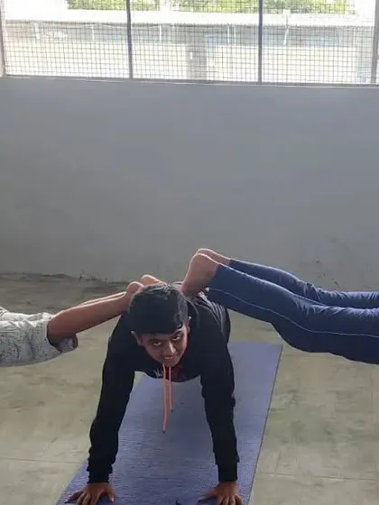 A duplicate of a three-person plank variation, a great team-building exercise.