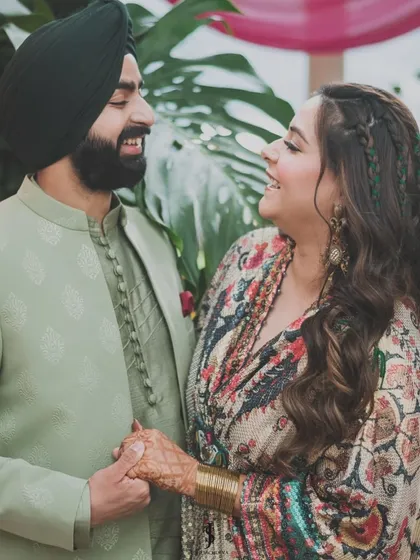 The way they look at each other says it all. This is a great example of how a couple's style can be coordinated without being overly matched, creating a natural and authentic feel.