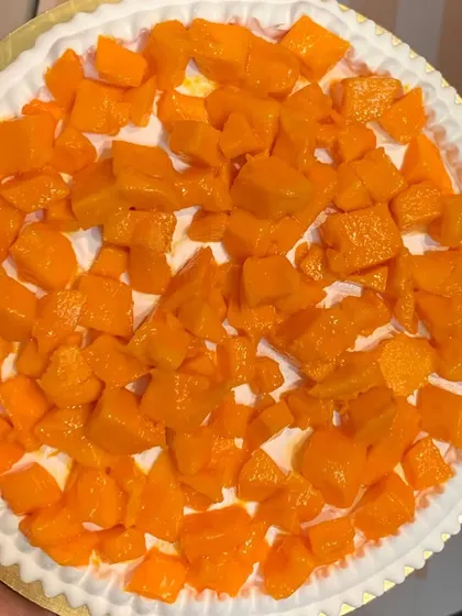 Another look at the delicious and plentiful fresh mango topping on one of our cakes.