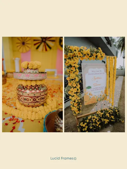 A detail shot of the vibrant Haldi decor, featuring marigolds and painted pots.