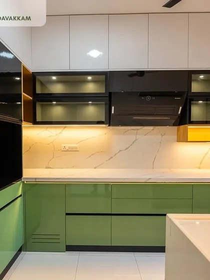 A closer look at the high-gloss green and white cabinets in the Casagrand Zenith kitchen, highlighting the quality of the finish and the sleek, modern design.